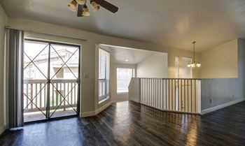 Loft area with ceiling fan